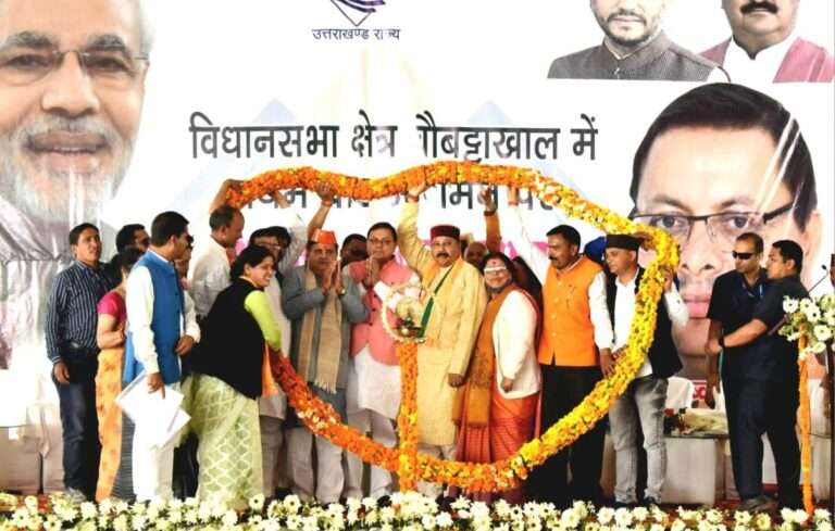 CM Dhami and Minister Satpal Maharaj