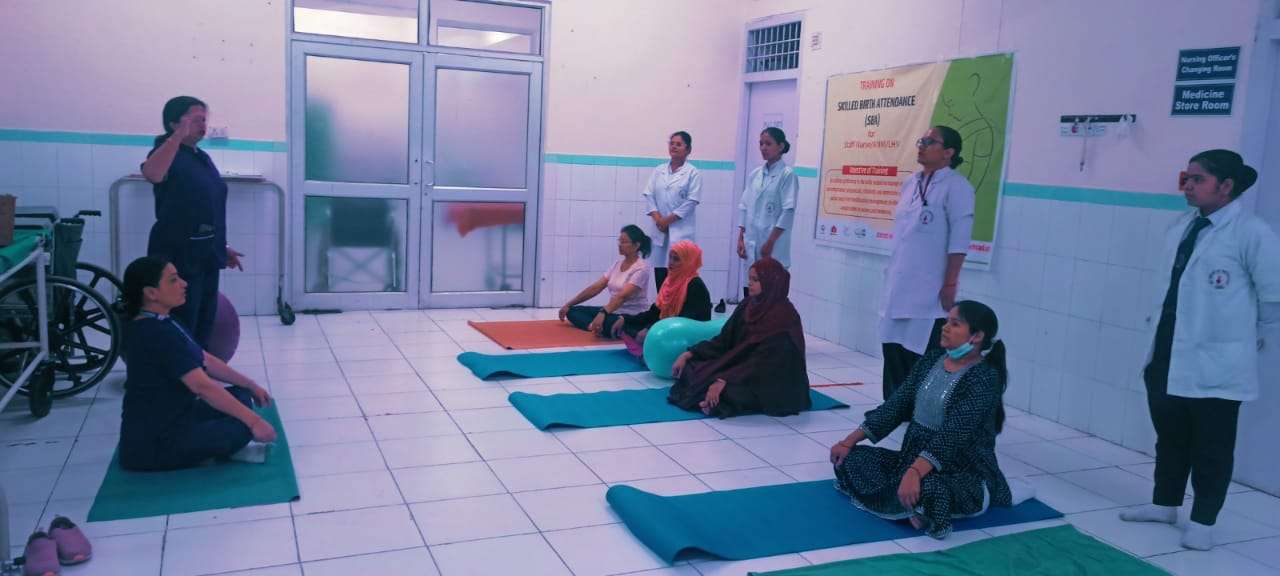 world yoga day with pregnant women